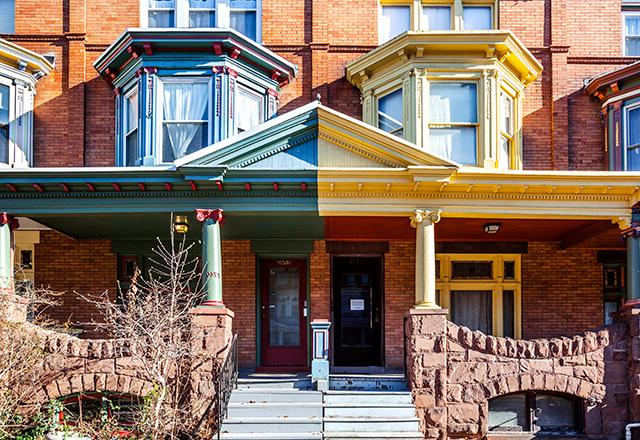 Front porches of rowhomes in Charles Village.